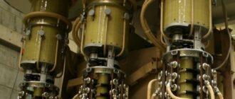 Три однофазных устройства РПН, установленных на крышке трансформатора